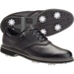 Black leather golf shoes with spikes.