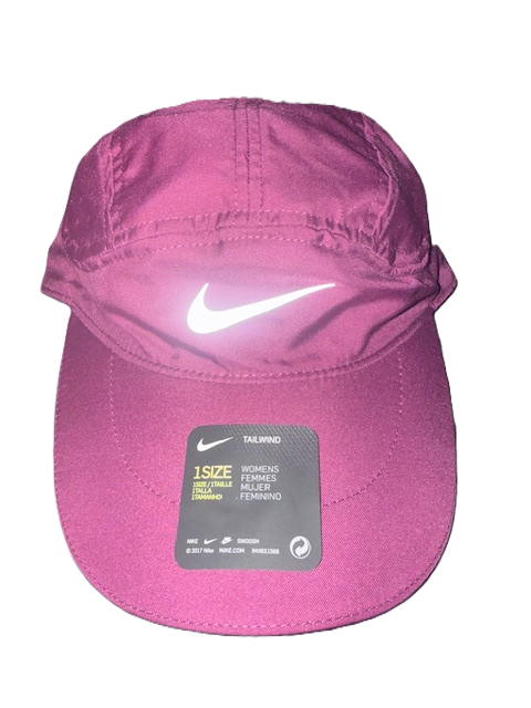 Pink Nike cap with reflective logo.