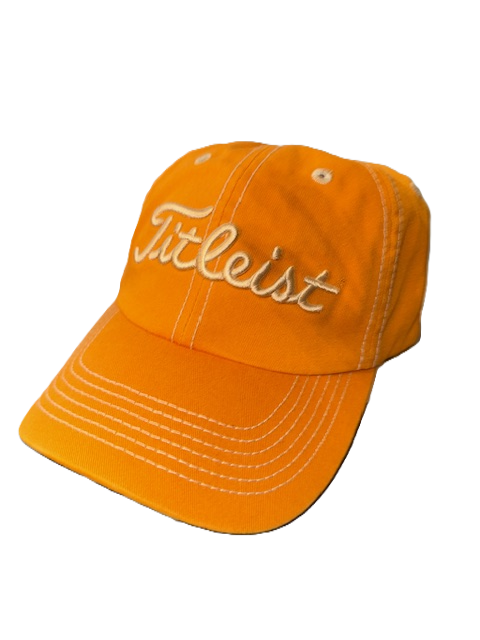 Orange Titleist cap with white stitching.