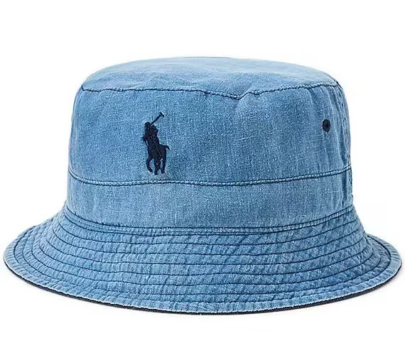 Blue denim bucket hat with embroidered logo.