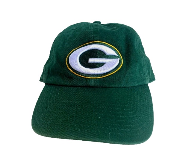 Green cap with embroidered "G" logo.