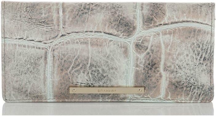 Crocodile-patterned wallet with metal logo plate.